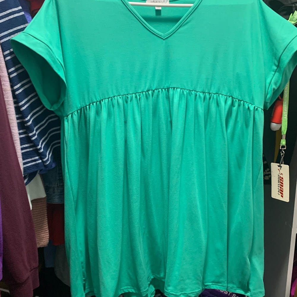 A green Flowey shirt ,excellent condition, worn once, smoke-free home, medium